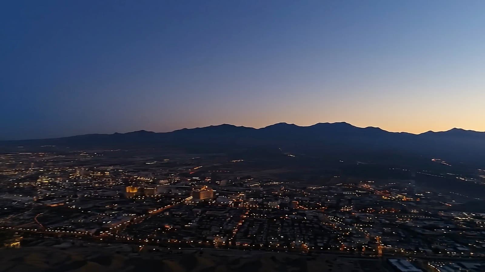 A frame from the production — first light over the Las Vegas valley the morning after.